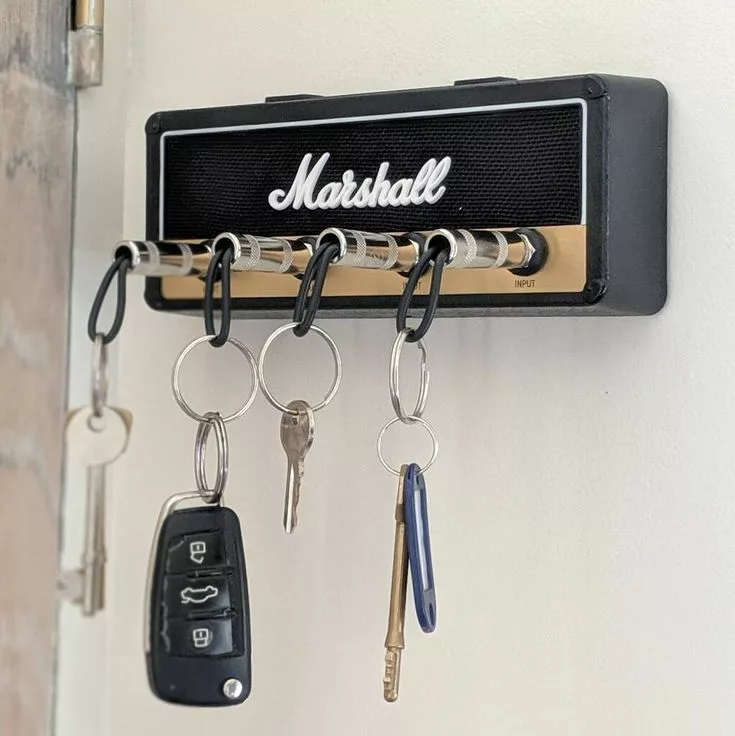 Amplifier key holder with jack keychain