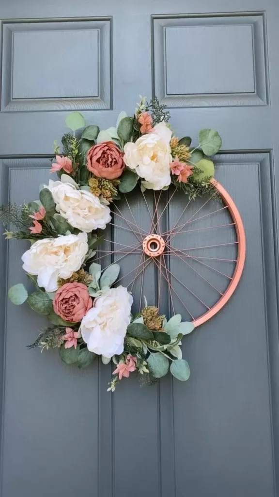 Bike wheel wreath on front door