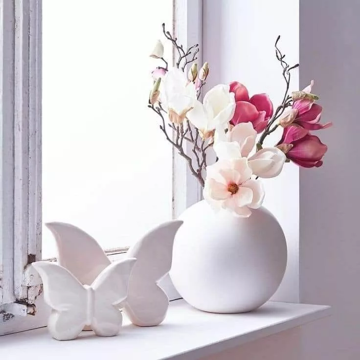 Ceramic butterflies with blossoms