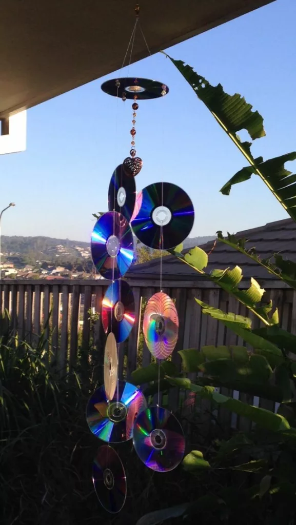 Keep pigeons away from balcony by hanging old CDs