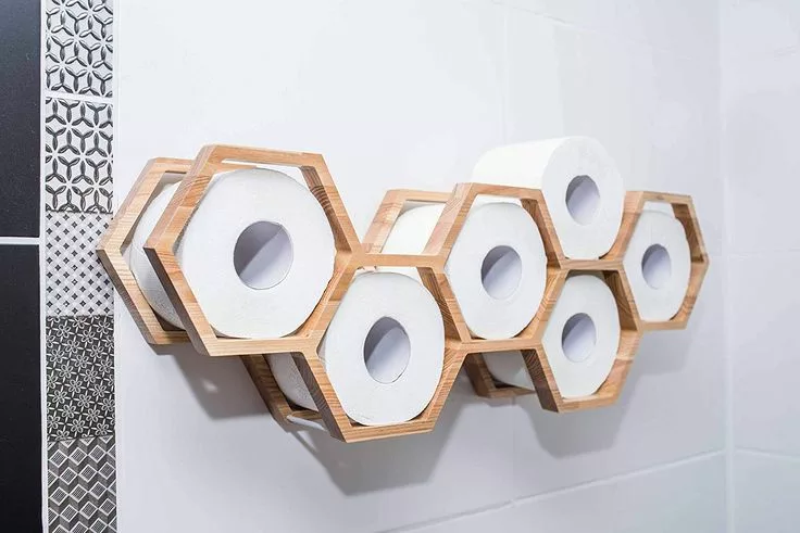 Shelf shaped like honeycomb as toilet paper holder